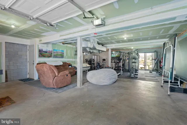 a view of a livingroom with furniture and a chandelier