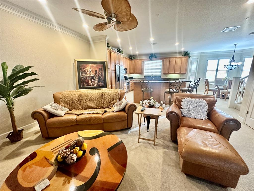 135 Shoals Circle North Redington Beach, FL 33708 - Photo 30 of 80 a living room with furniture and a large window