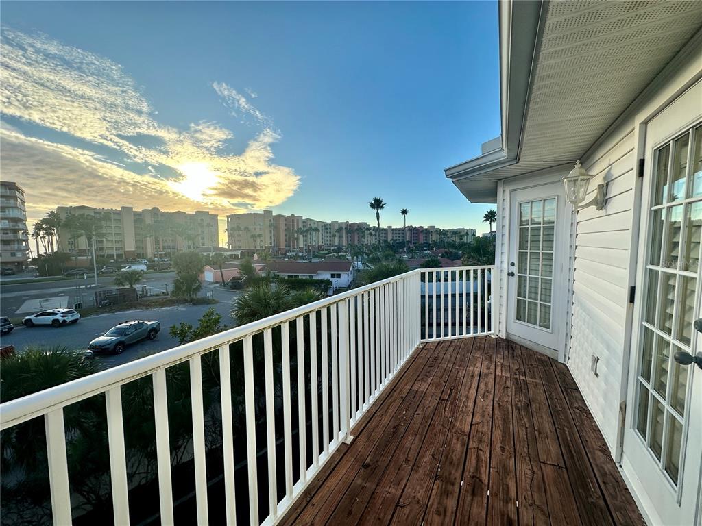 135 Shoals Circle North Redington Beach, FL 33708 - Photo 53 of 80 a view of a balcony with wooden floor