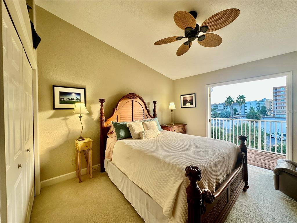 135 Shoals Circle North Redington Beach, FL 33708 - Photo 60 of 80 a bedroom with a bed and a window