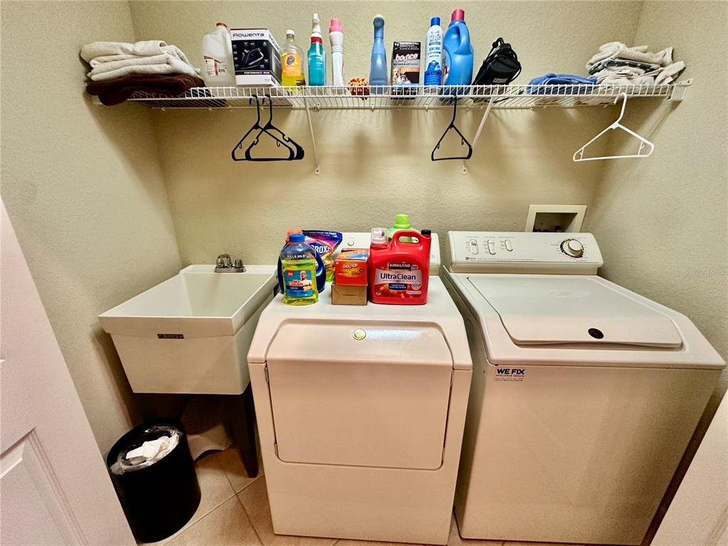 135 Shoals Circle North Redington Beach, FL 33708 - Photo 62 of 80 a utility room with dryer and washer