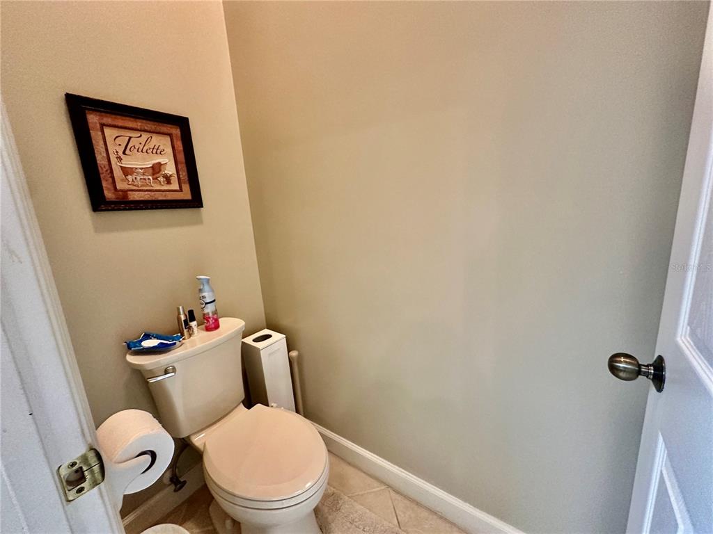 135 Shoals Circle North Redington Beach, FL 33708 - Photo 65 of 80 a white toilet sitting next to a shower