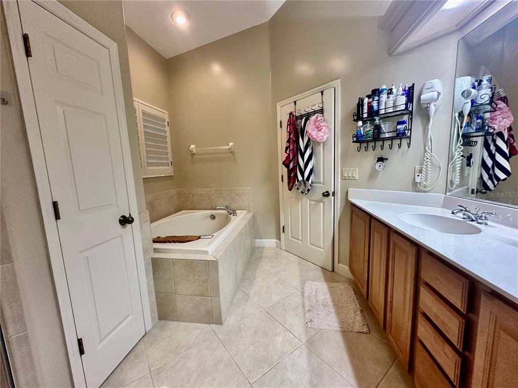 135 Shoals Circle North Redington Beach, FL 33708 - Photo 66 of 80 a bathroom with a sink a toilet and shower
