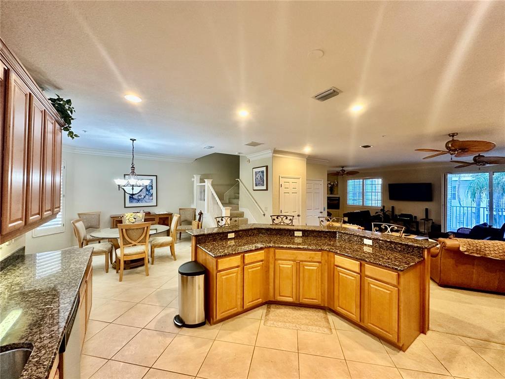 135 Shoals Circle North Redington Beach, FL 33708 - Photo 70 of 80 a kitchen with lots of counter top space and windows