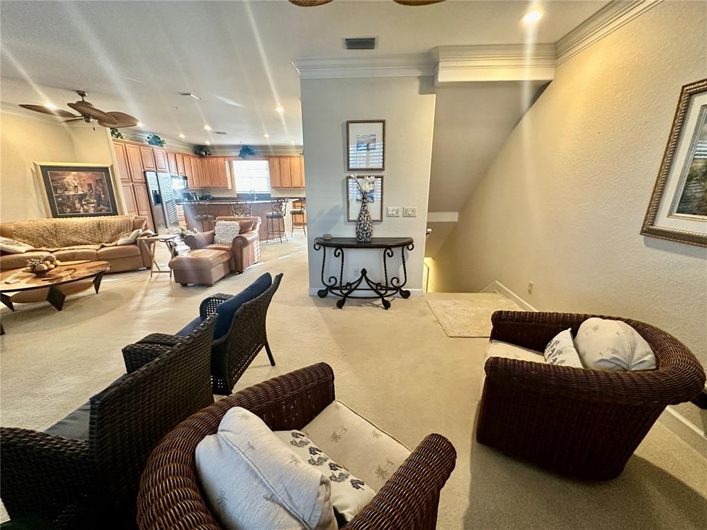 135 Shoals Circle North Redington Beach, FL 33708 - Photo 9 of 80 a living room with furniture and a couch