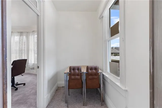 a view of workspace and couch