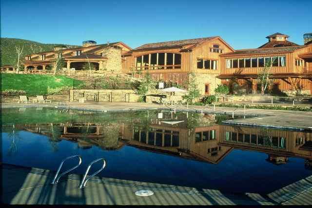 147 Midland Loop Carbondale, CO 81623 - Photo 5 of 6 a front view of residential houses with outdoor space and swimming pool