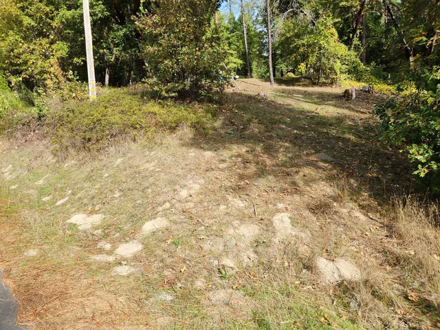 a room with a couch and a large window