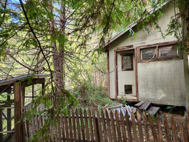 a view of front door and porch with furniture
