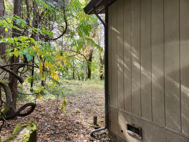 a view of bathroom with a sink and a mirror
