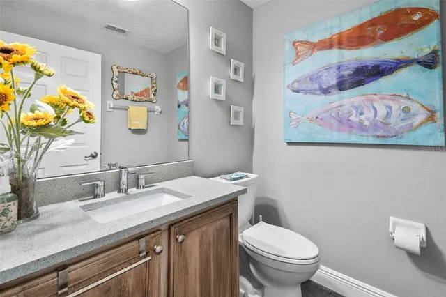 a view of entryway livingroom and hall with wooden floor