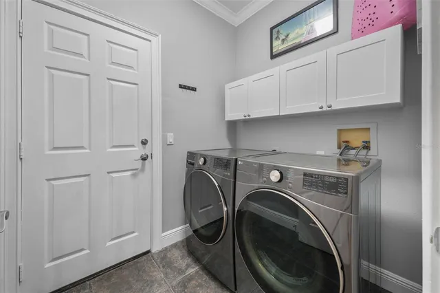 a view of hallway with wooden floor