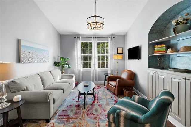 a bathroom with a sink a toilet and shower curtain