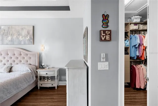 a bathroom with a granite countertop bathtub shower sink and toilet