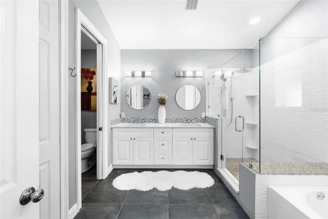 a view of a porch with chairs and backyard