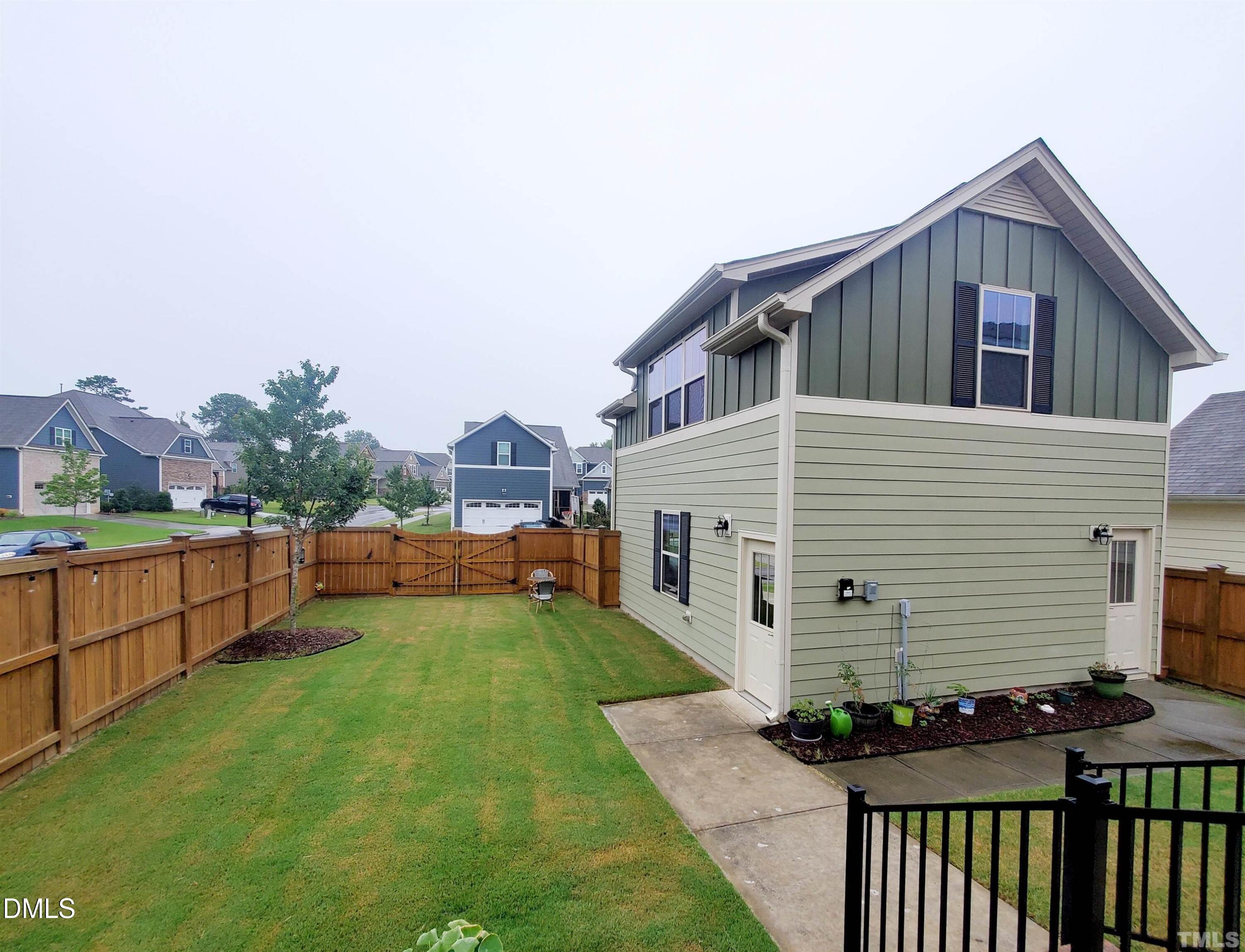 2700 Jockeys Rdg Trace Apex, NC 27502 - Photo 16 of 18 a view of a house with a yard