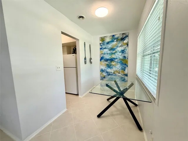 a view of an entryway with a workspace