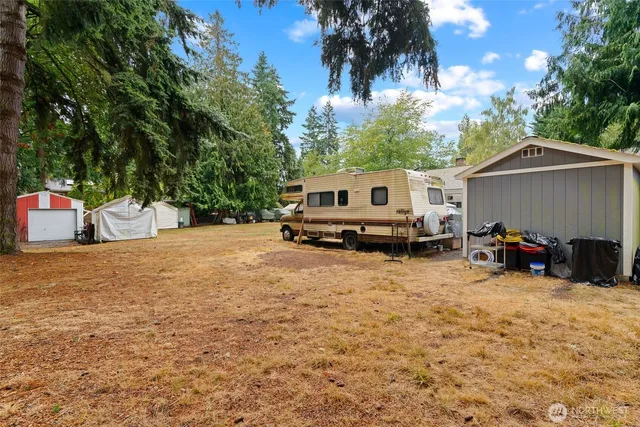 a view of a swimming pool with an outdoor seating