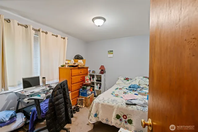 a utility room with sink dryer and washer