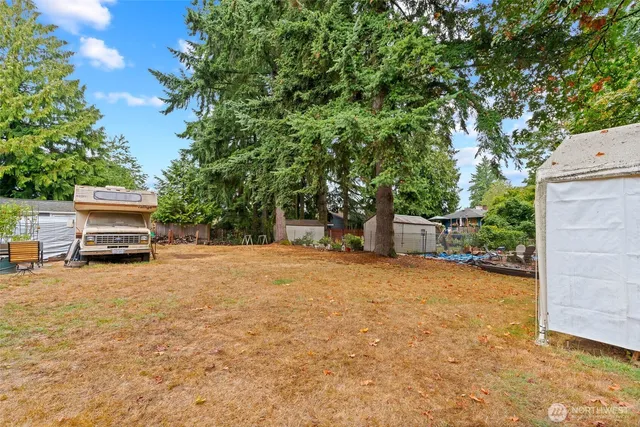 a house with trees in front of it