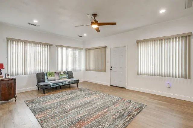 a living room with furniture and window