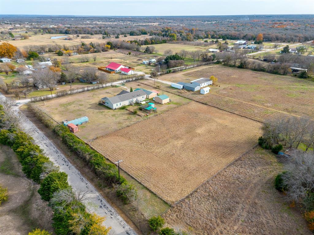 13740 County Road 4041 Scurry, TX 75158 - Photo 3 of 40 an aerial view of a city