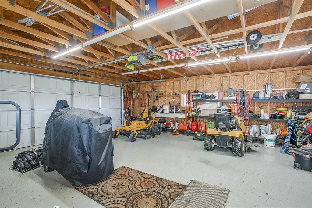 13740 County Road 4041 Scurry, TX 75158 - Photo 36 of 40 a view of parking garage with cars