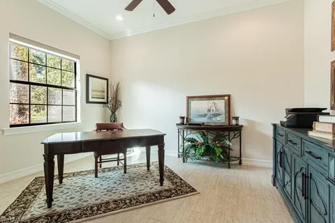 a view of a workspace with furniture