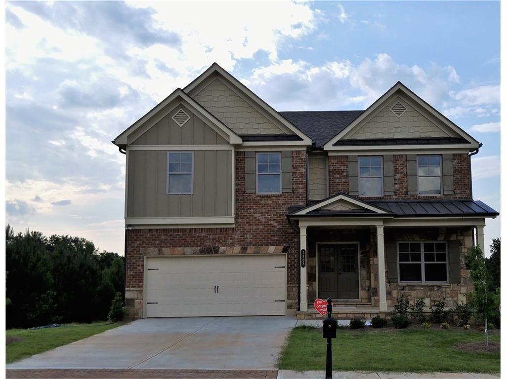 3793 Ridge Grove Way Suwanee, GA 30024 - Photo 1 of 1 a front view of a house with a yard