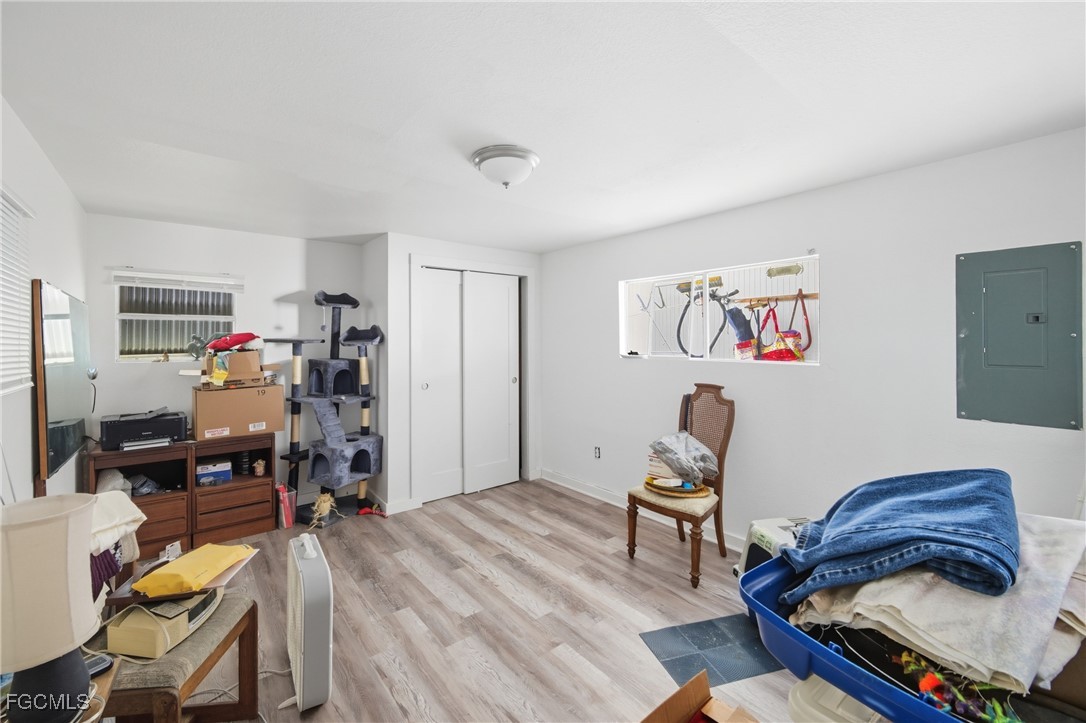 136 Lexington Avenue Fort Myers, FL 33908 - Photo 15 of 31 a living room with furniture and wooden floor