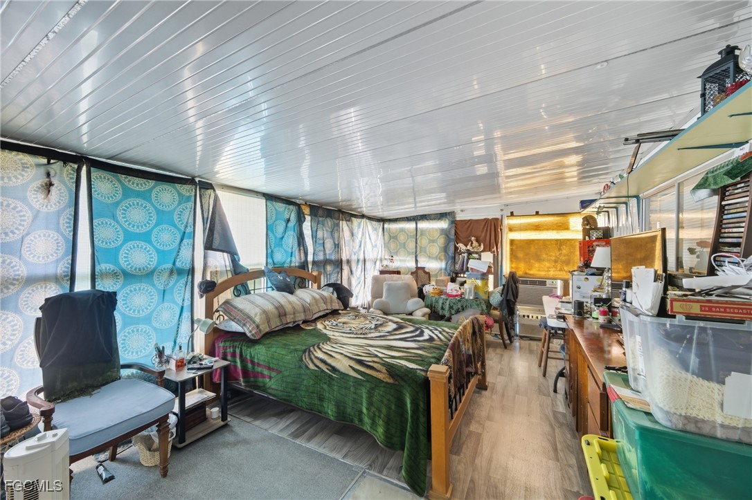 136 Lexington Avenue Fort Myers, FL 33908 - Photo 17 of 31 a living room with lots of furniture and a large window