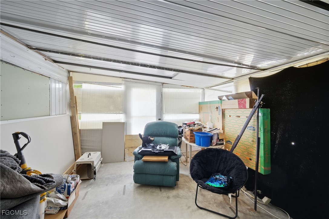 136 Lexington Avenue Fort Myers, FL 33908 - Photo 20 of 31 a living room with furniture and a window