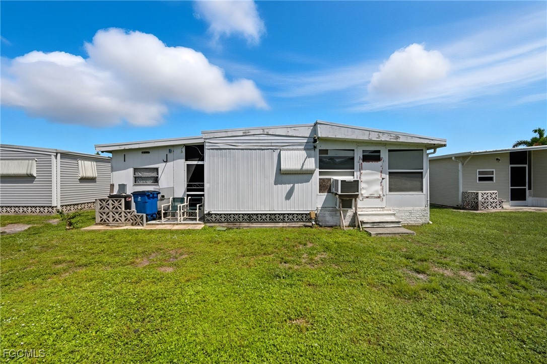 136 Lexington Avenue Fort Myers, FL 33908 - Photo 23 of 31 a view of a house with a patio