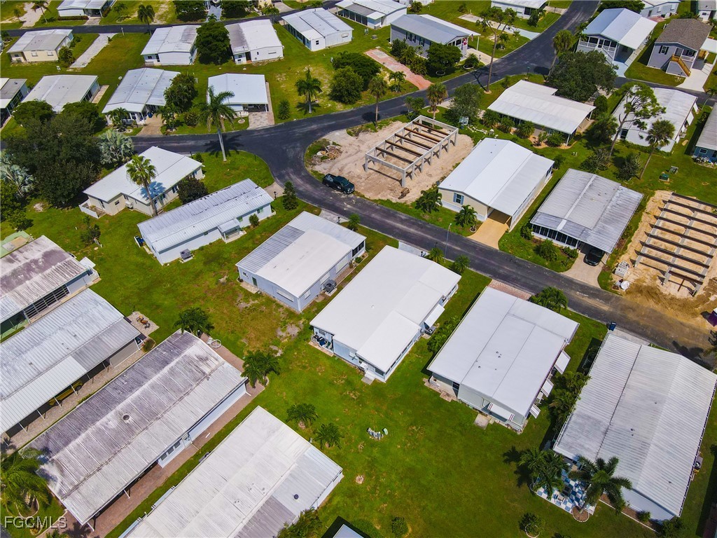 136 Lexington Avenue Fort Myers, FL 33908 - Photo 26 of 31 an aerial view of a house with a garden
