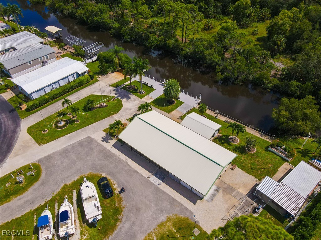 136 Lexington Avenue Fort Myers, FL 33908 - Photo 29 of 31 an aerial view of a house with a garden