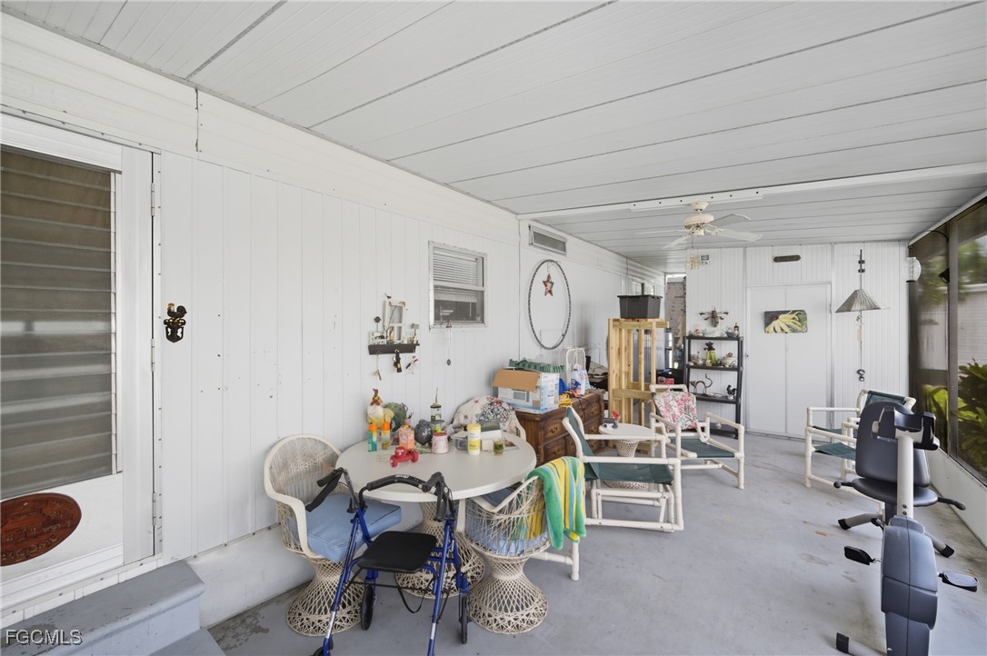 136 Lexington Avenue Fort Myers, FL 33908 - Photo 3 of 31 a room with furniture a rug and white walls
