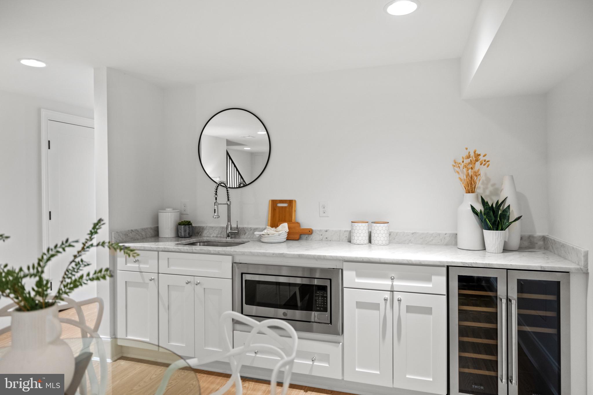 626 I Street Northeast Washington, DC 20002 - Photo 58 of 66 Wet bar w/built-in microwave & beverage fridge.