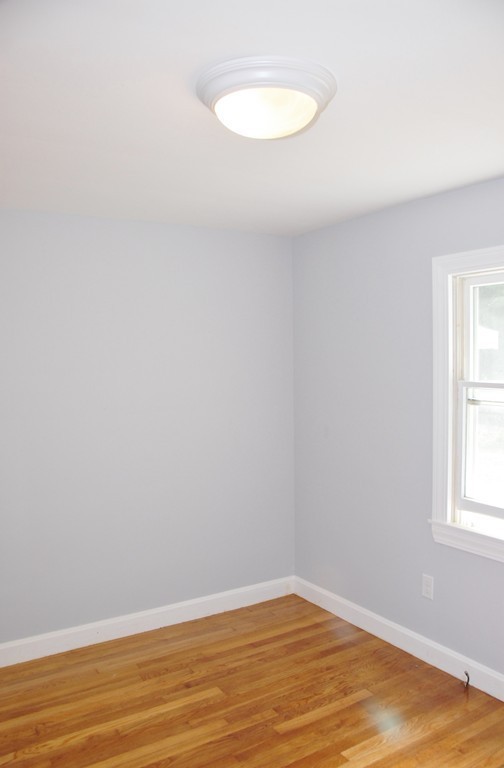 17 Margaret Road Hamilton, MA 01982 - Photo 16 of 24 a view of a small space with wooden floor and a window