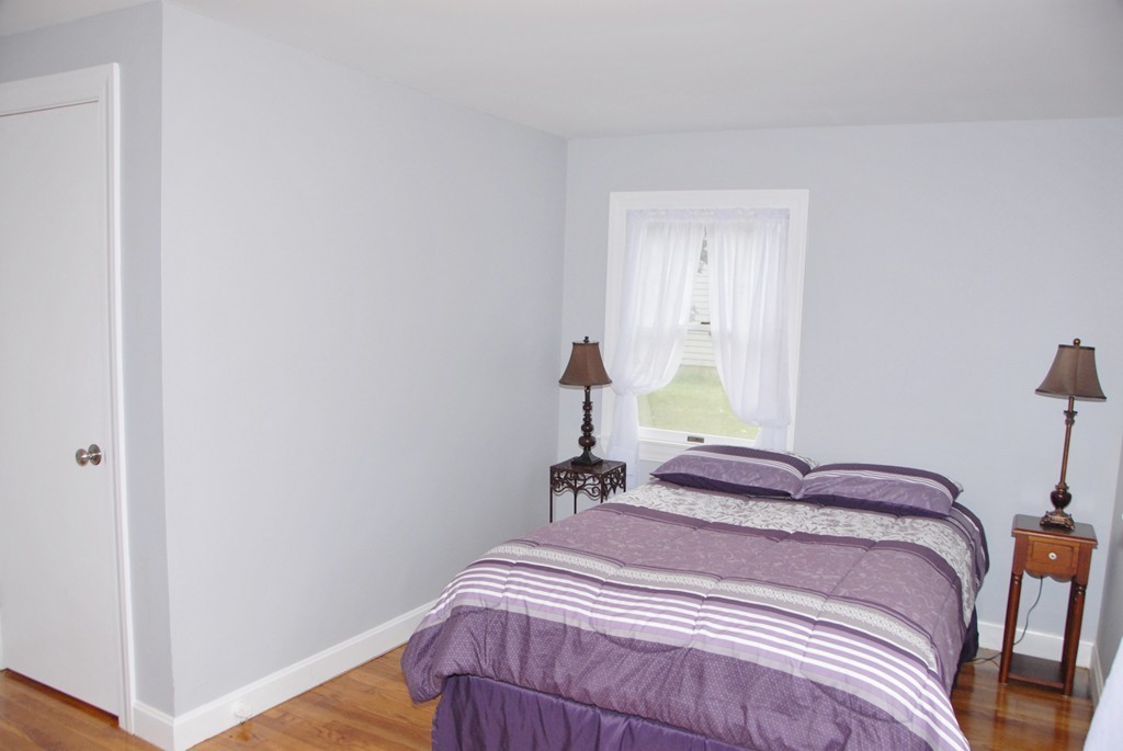 17 Margaret Road Hamilton, MA 01982 - Photo 18 of 24 a bedroom with a bed and a window