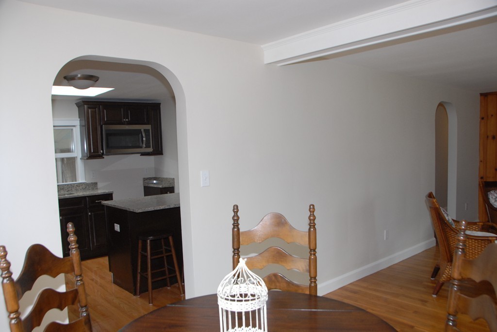 17 Margaret Road Hamilton, MA 01982 - Photo 9 of 24 a view of a workspace with furniture and a window