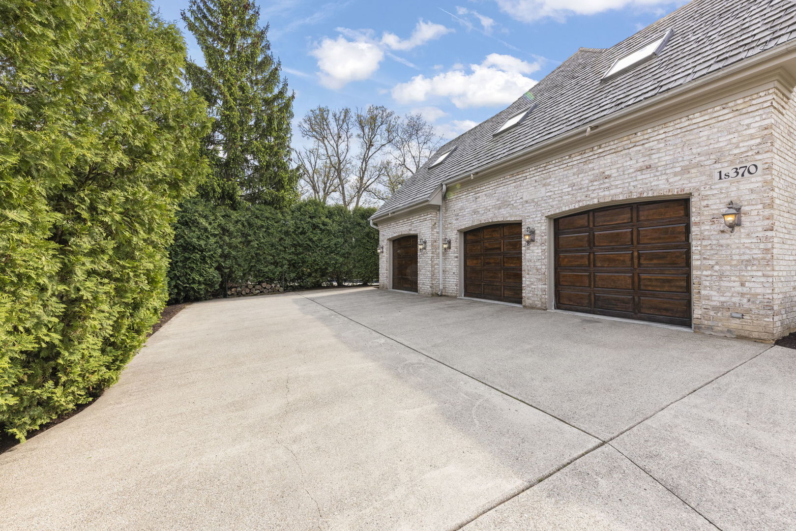 1S151 Winfield Road Wheaton, IL 60189 - Photo 70 of 73 a view of a house with a yard and garage