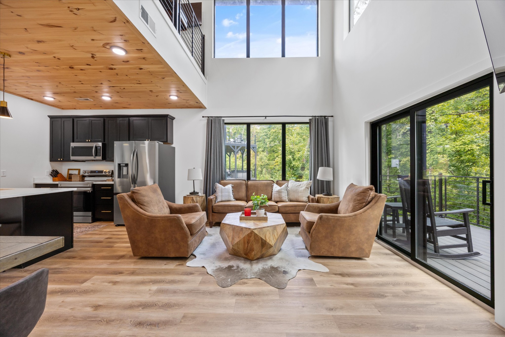 1134 Reedmont Way Sevierville, TN 37876 - Photo 11 of 42 a living room with fireplace furniture and a large window
