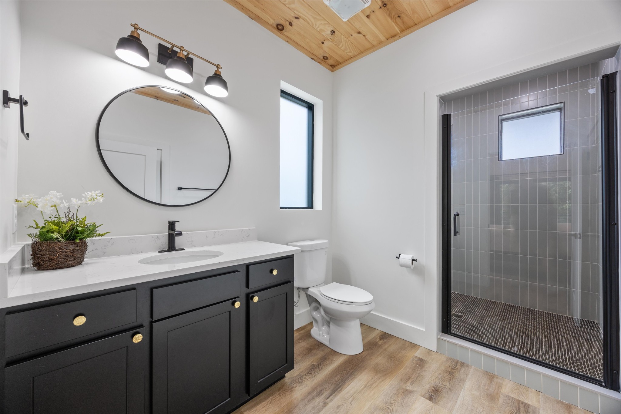 1134 Reedmont Way Sevierville, TN 37876 - Photo 16 of 42 a bathroom with a toilet sink and mirror