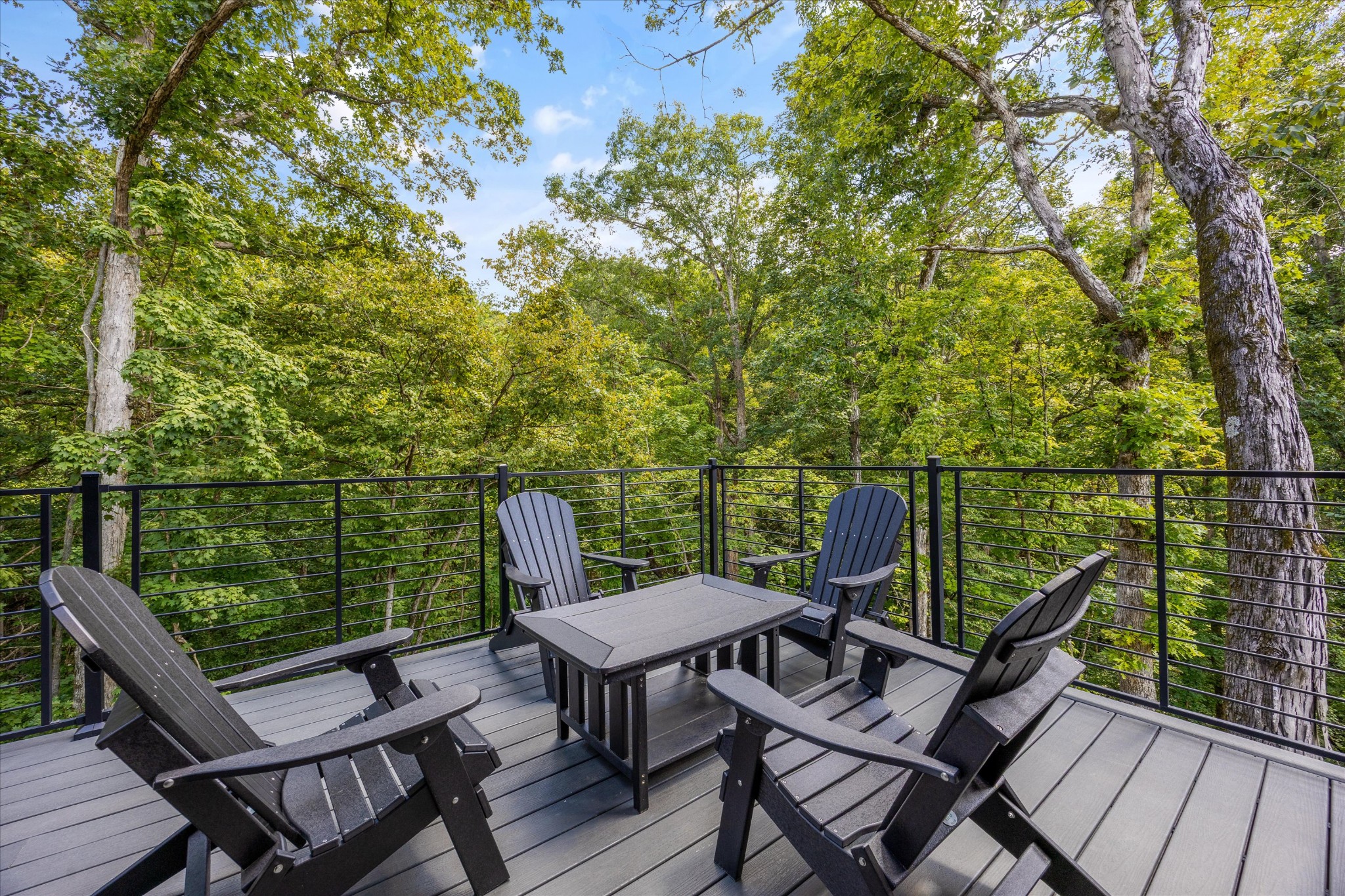 1134 Reedmont Way Sevierville, TN 37876 - Photo 20 of 42 a view of a balcony with wooden floor and outdoor seating