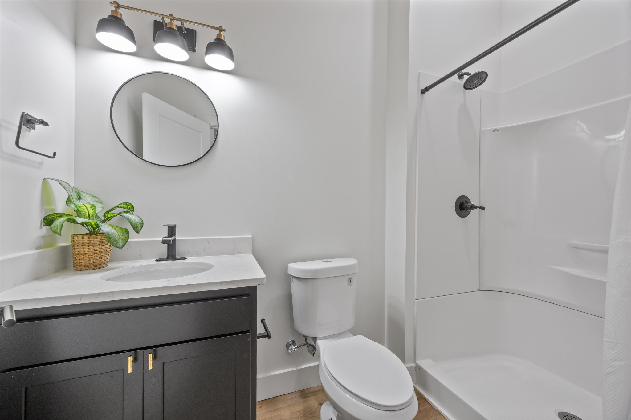 1134 Reedmont Way Sevierville, TN 37876 - Photo 33 of 42 a bathroom with a sink a toilet and a mirror