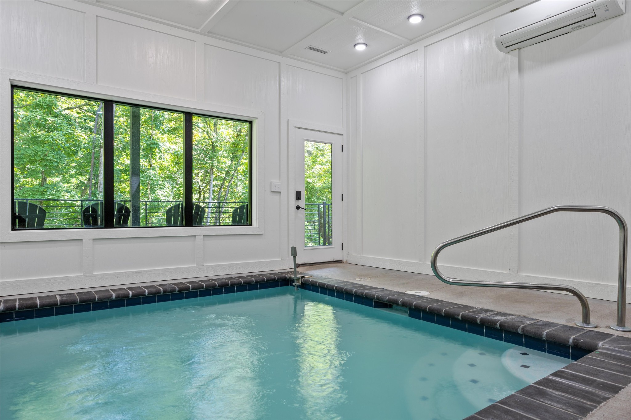 1134 Reedmont Way Sevierville, TN 37876 - Photo 35 of 42 a bathroom with a tub and large window