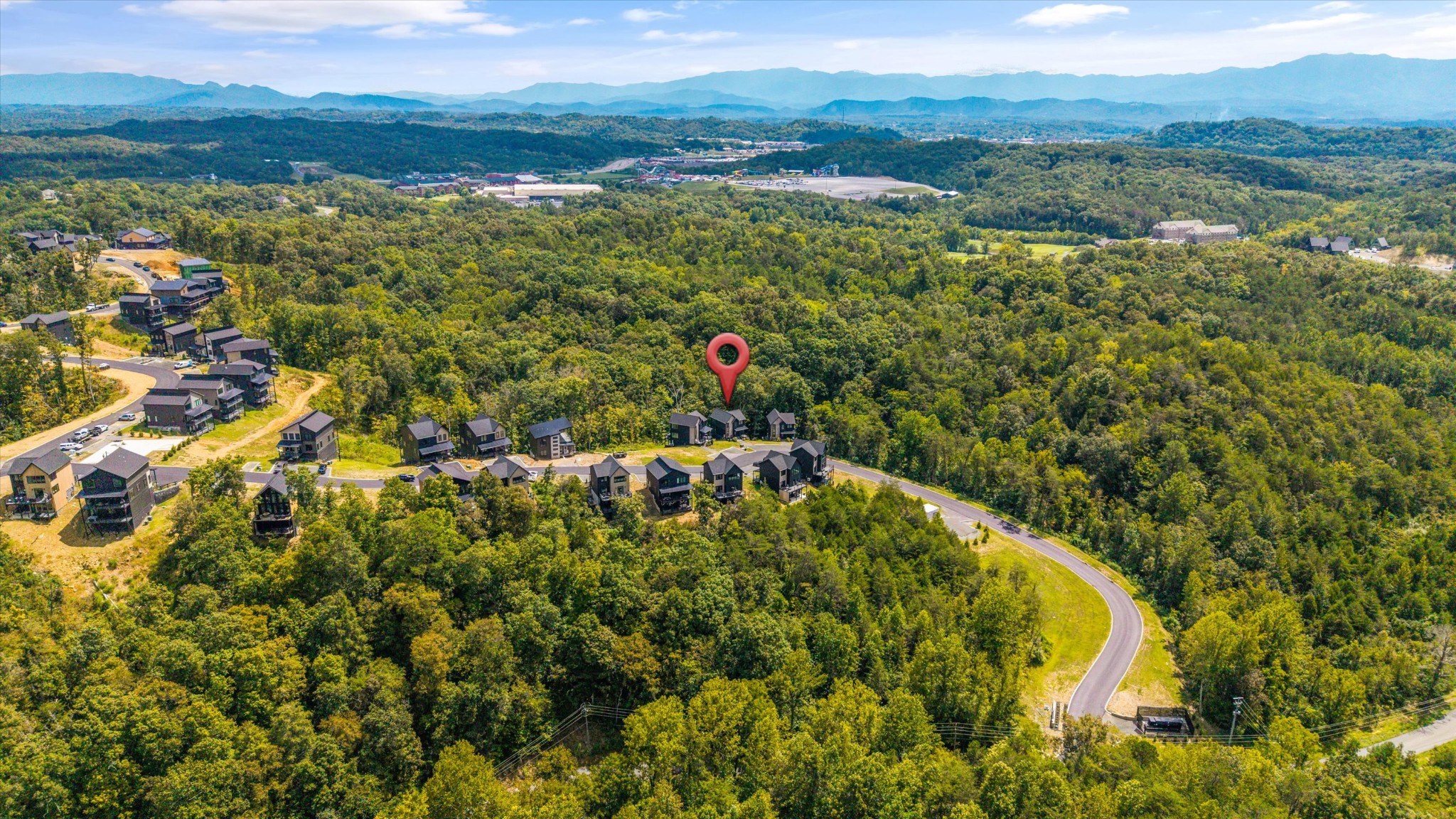 1134 Reedmont Way Sevierville, TN 37876 - Photo 41 of 42 a view of a forest with a lake