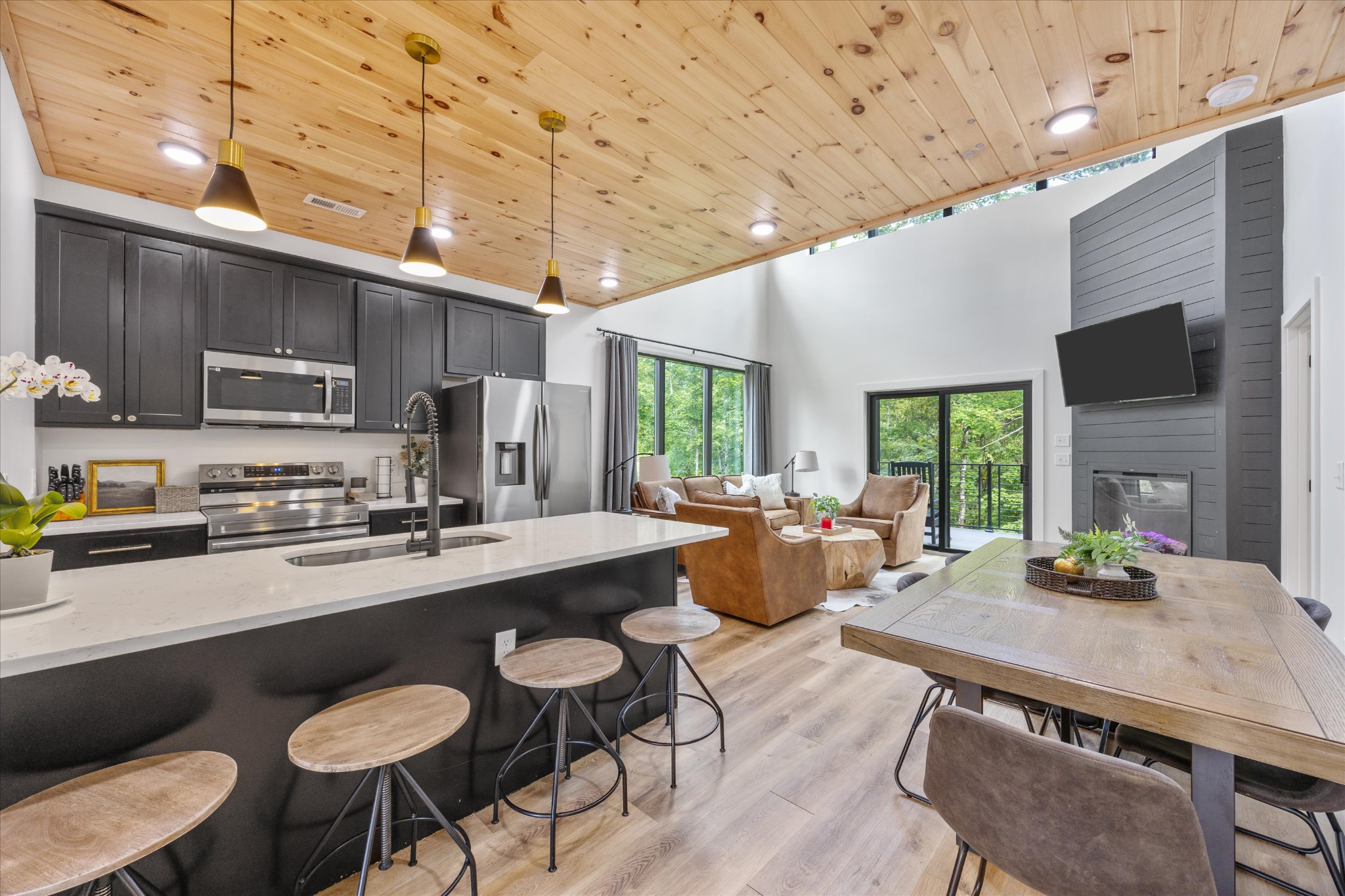 1134 Reedmont Way Sevierville, TN 37876 - Photo 6 of 42 a kitchen with a table chairs stove and refrigerator