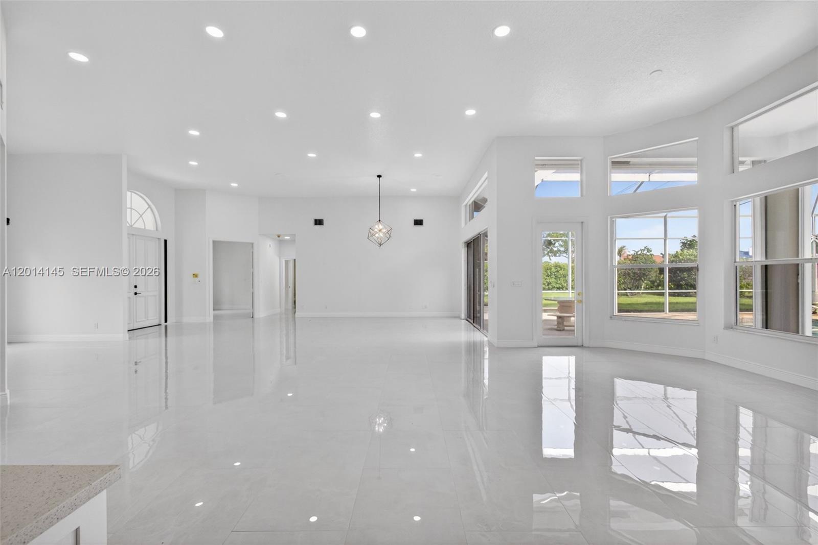 19558 Red Gum Trail Jupiter, FL 33458 - Photo 19 of 81 a view of an empty room with a window