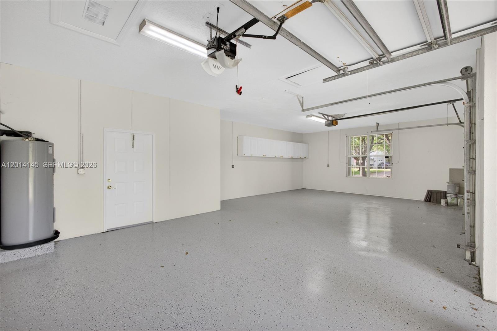 19558 Red Gum Trail Jupiter, FL 33458 - Photo 50 of 81 a view of a garage